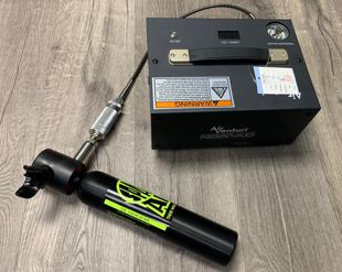 Nomad III Portable Breathing Air Compressor Refilling a Spare Air